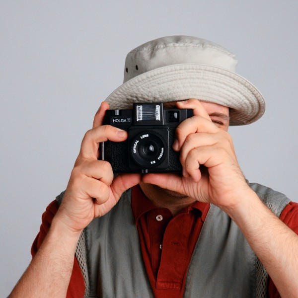 Mr. Holga in a Domke photog vest and old-man bucket hat with his Holga 120 FN (photo by Mr. Holga) Mr. Holga in a Domke photog vest and old-man bucket hat with his Holga 120 FN (photo by Mr. Holga)